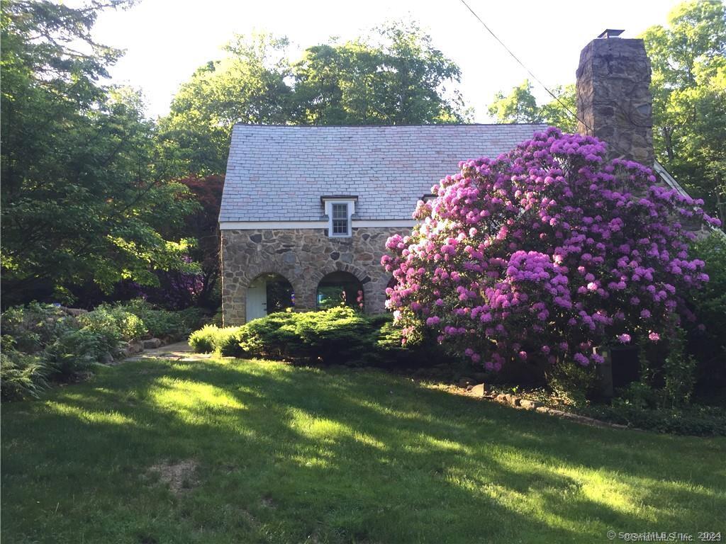 178 Ferris Hill Road New Canaan, CT 06840 - Photo 3 of 19 a view of a house with a big yard
