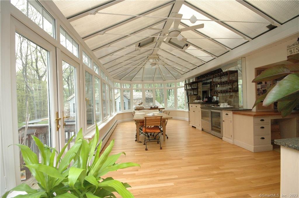 178 Ferris Hill Road New Canaan, CT 06840 - Photo 10 of 19 a very nice looking room with a large window and furniture