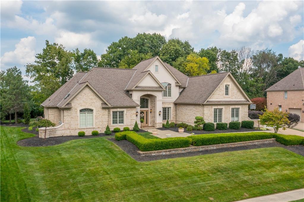 247 Whetherburn Drive Wexford, PA 15090 - Photo 1 of 25 a front view of a house with a garden and trees