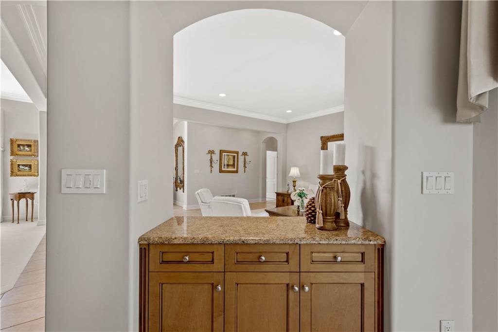 247 Whetherburn Drive Wexford, PA 15090 - Photo 12 of 25 a bathroom with a granite countertop sink a mirror and vanity