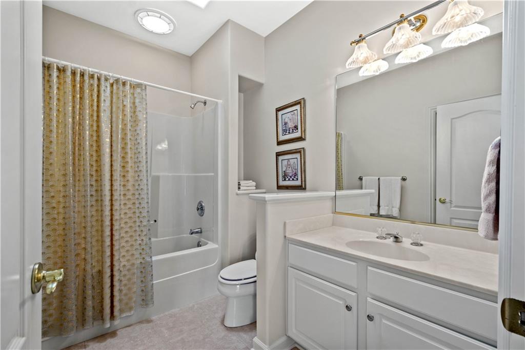 247 Whetherburn Drive Wexford, PA 15090 - Photo 17 of 25 a bathroom with a sink a toilet and shower