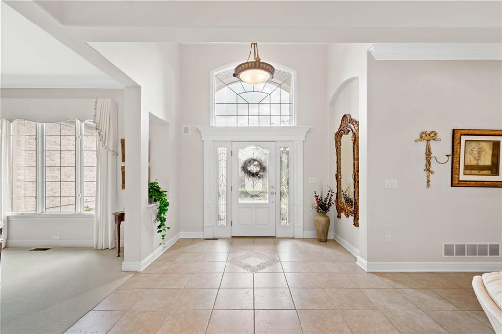 247 Whetherburn Drive Wexford, PA 15090 - Photo 2 of 25 a view of an entryway with a chandelier