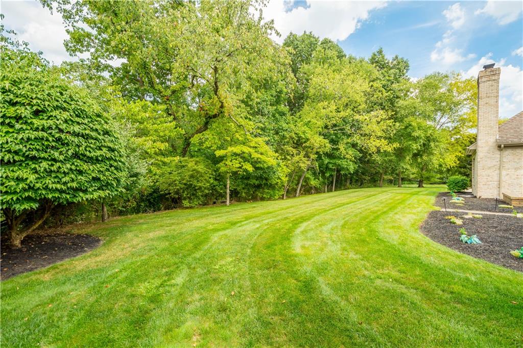 247 Whetherburn Drive Wexford, PA 15090 - Photo 23 of 25 a view of a yard with a tree