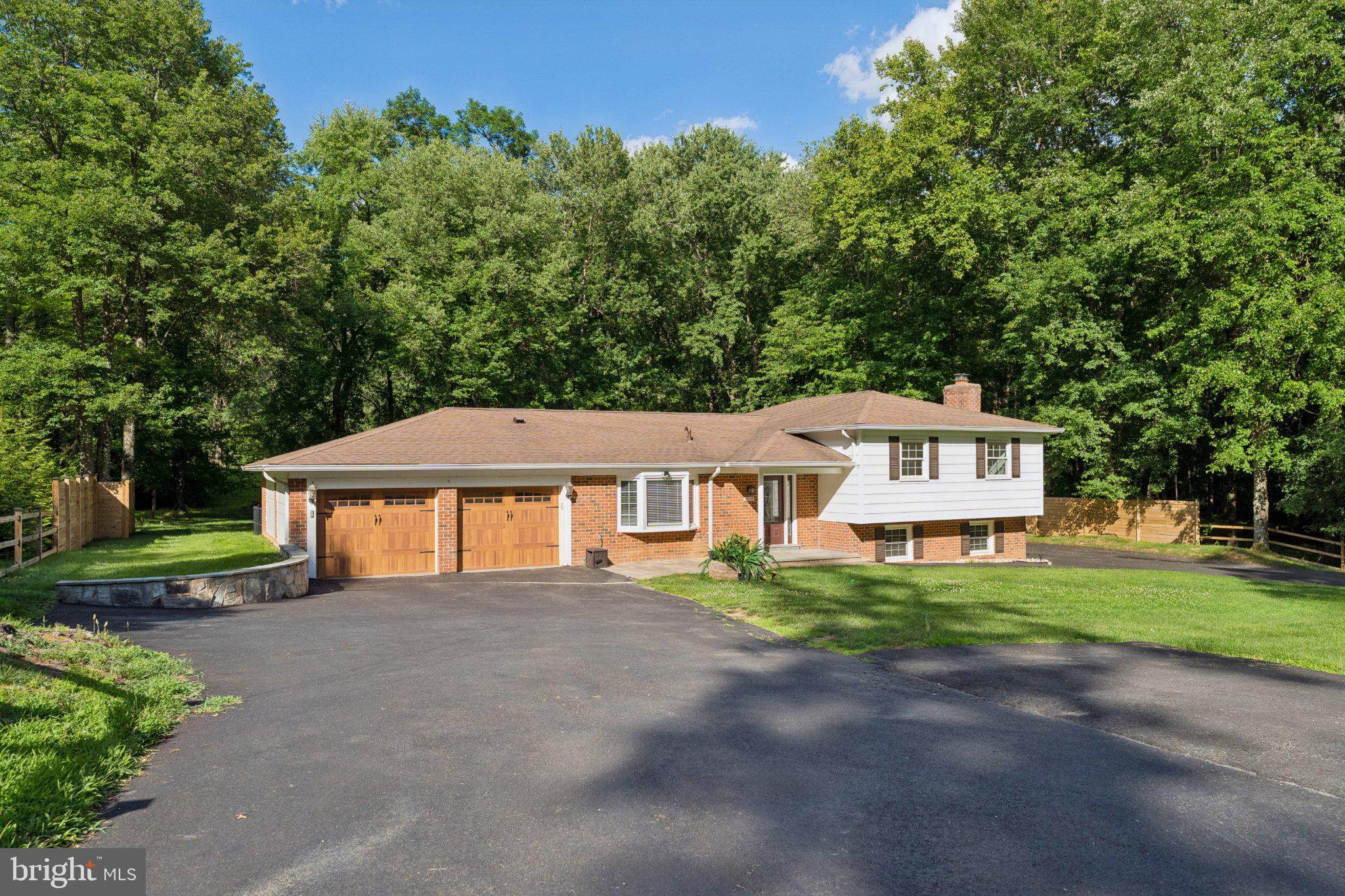 3219 Fox Mill Road Oakton, VA 22124 - Photo 3 of 87 Charming home nestled in lush greenery.