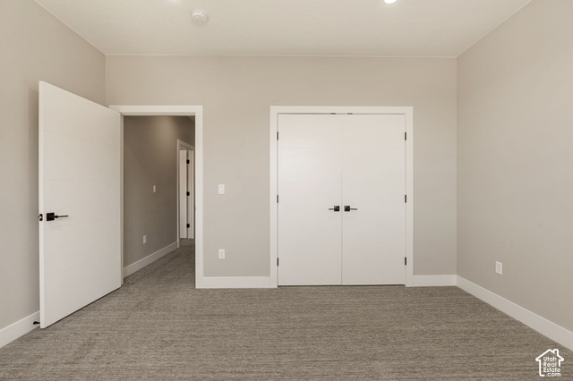 1192 East Ashdown Road Cedar City, UT 84721 - Photo 88 of 96 Recessed lighting, wall-to-wall carpeting, contemporary interior doors, and modern door hardware