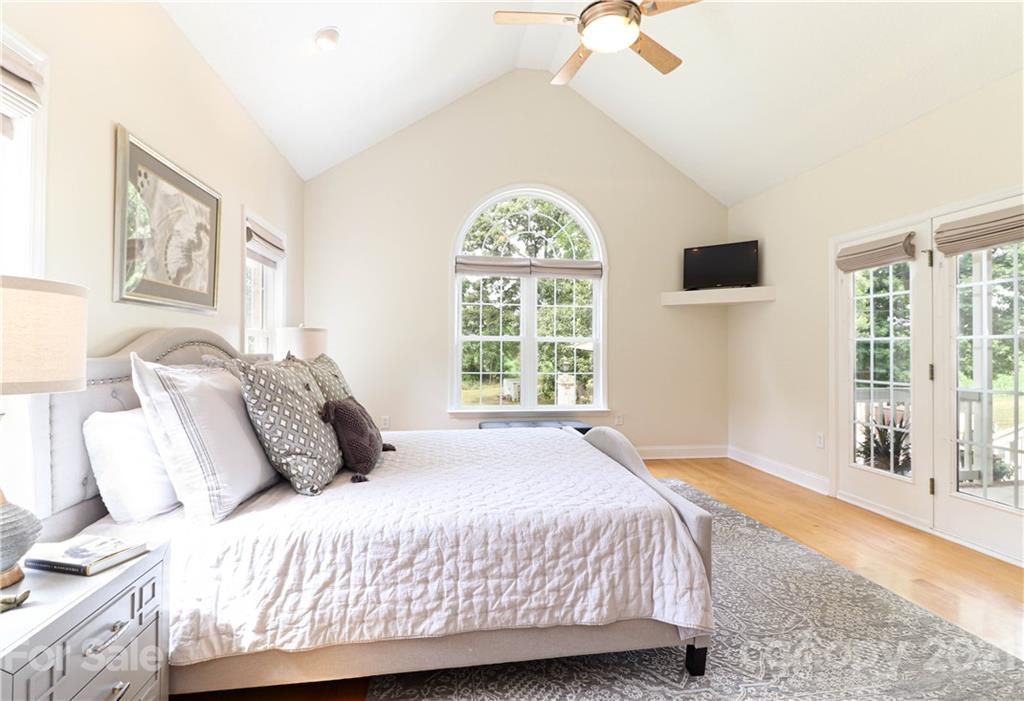 6023 Olive Branch Road Wingate, NC 28174 - Photo 20 of 44 a bedroom with a large bed and a window