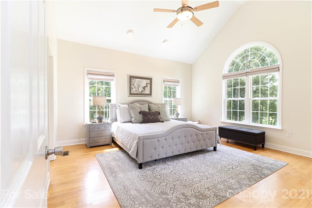 6023 Olive Branch Road Wingate, NC 28174 - Photo 21 of 44 a bedroom with a large bed and a window