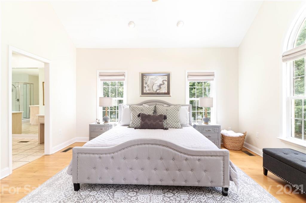 6023 Olive Branch Road Wingate, NC 28174 - Photo 22 of 44 a bedroom with a bed and a couch