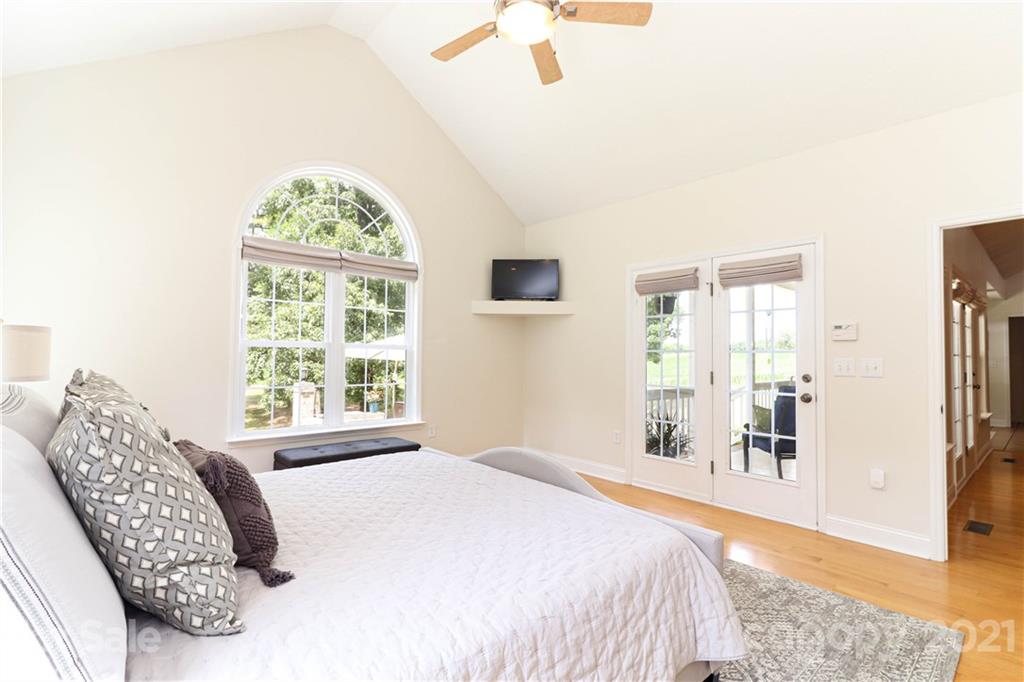 6023 Olive Branch Road Wingate, NC 28174 - Photo 24 of 44 a bedroom with a large bed and a window