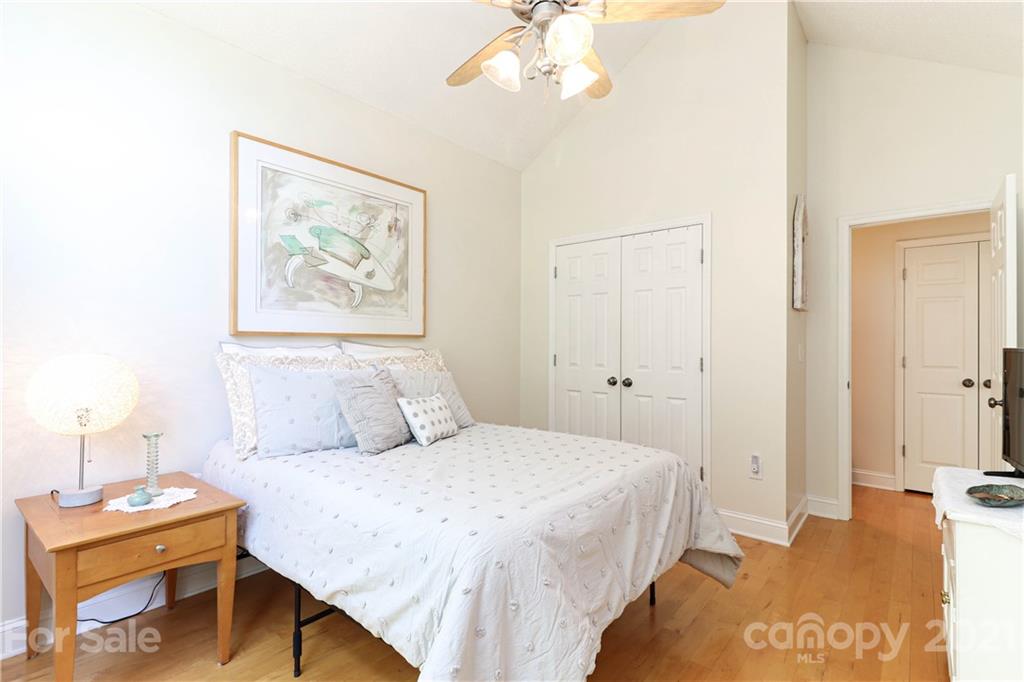 6023 Olive Branch Road Wingate, NC 28174 - Photo 28 of 44 a bedroom with a bed and a painting on the wall