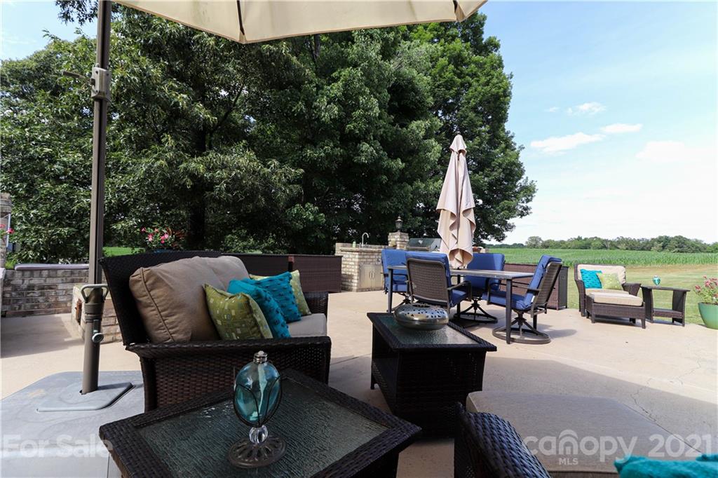 6023 Olive Branch Road Wingate, NC 28174 - Photo 38 of 44 a view of a terrace with furniture