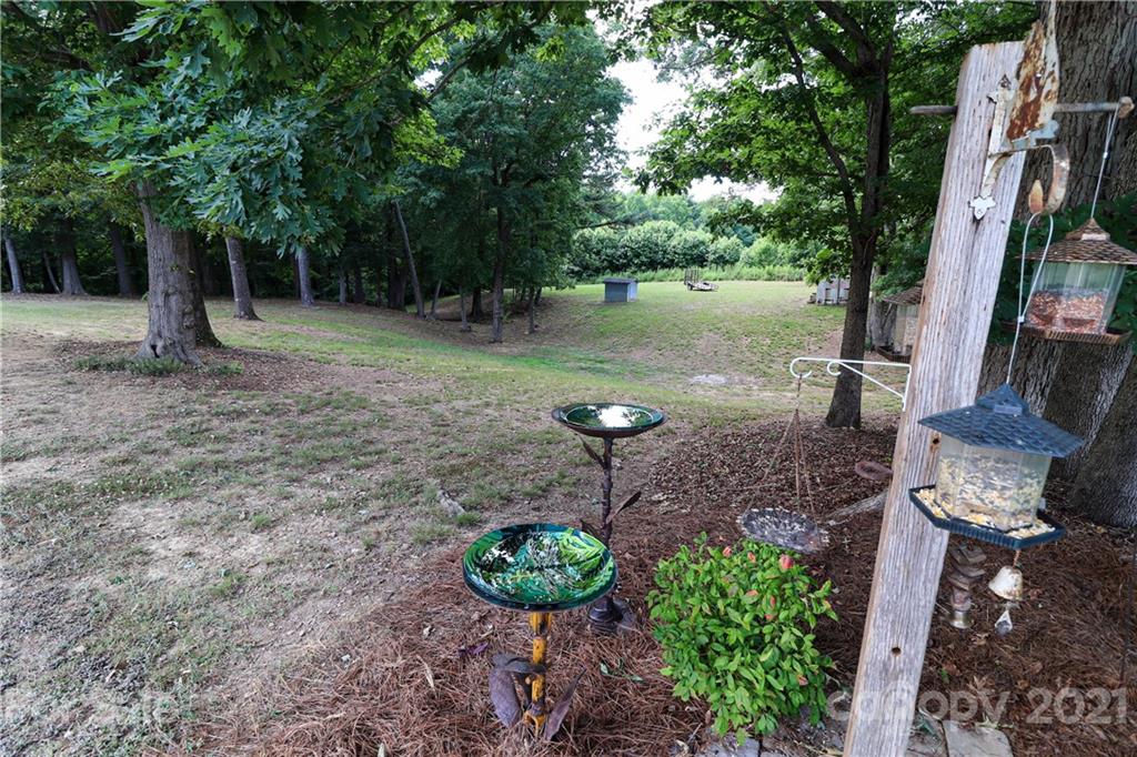 6023 Olive Branch Road Wingate, NC 28174 - Photo 42 of 44 a view of a garden with a sink