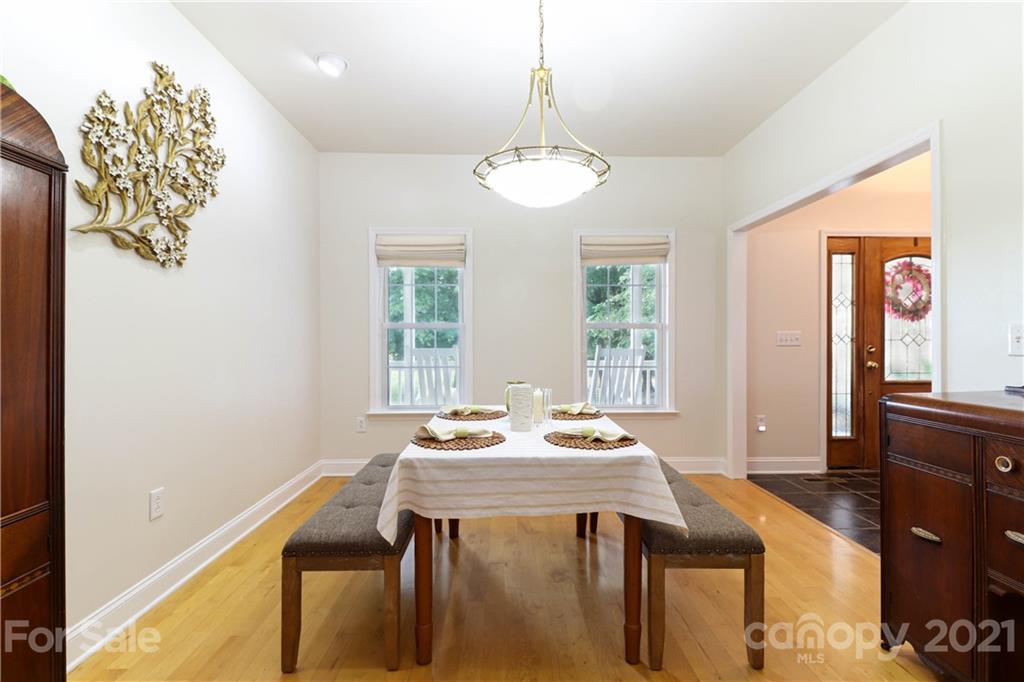 6023 Olive Branch Road Wingate, NC 28174 - Photo 10 of 44 a view of a dining room with furniture window and outside view