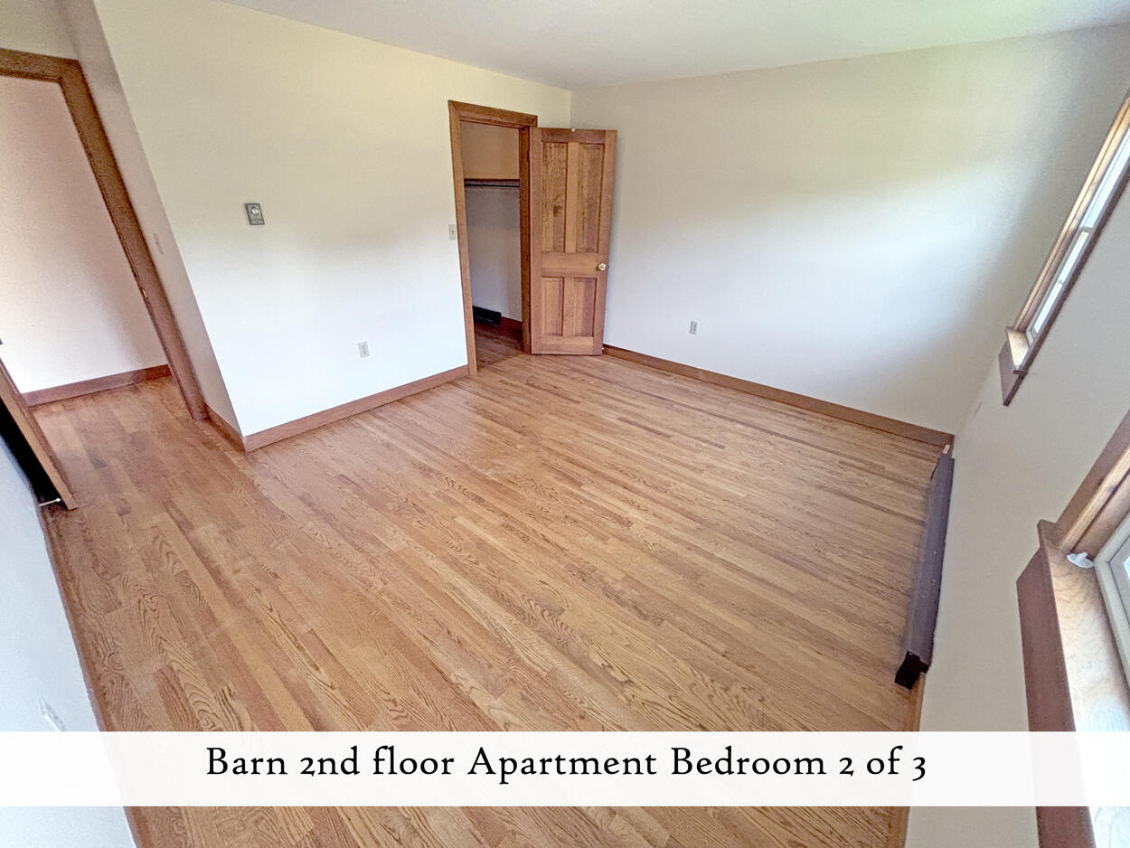 607 Oak Point Road Trenton, ME 04605 - Photo 138 of 187 Barn 2nd floor apartment bedroom 2 of 3