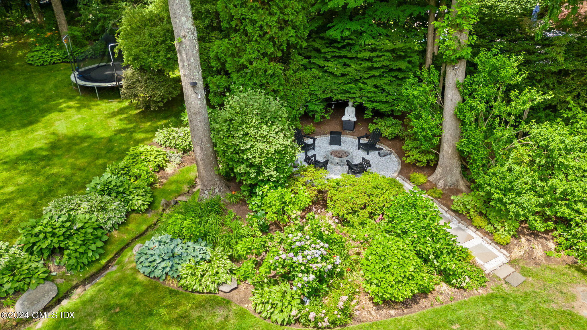 48 Glenville Road Greenwich, CT 06831 - Photo 58 of 62 an aerial view of a house with a yard