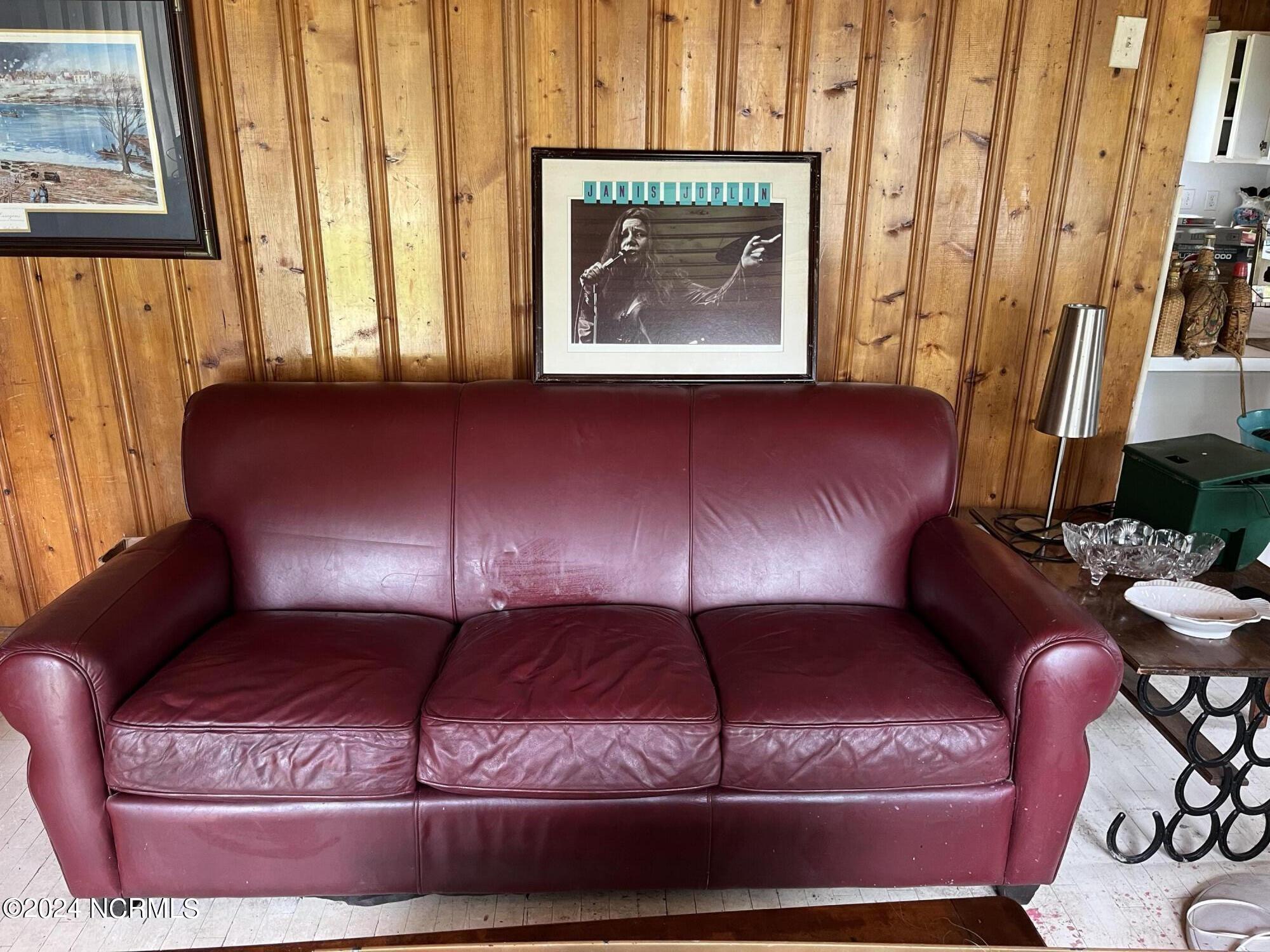 1018 Bayside Road Southport, NC 28461 - Photo 6 of 12 red sofa