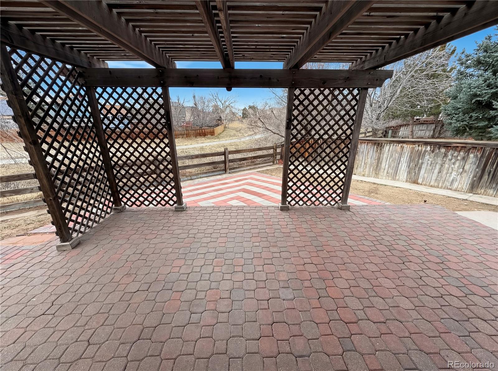 20000 Mitchell Place, Unit 45 Denver, CO 80249 - Photo 29 of 29 a view of a wooden fence