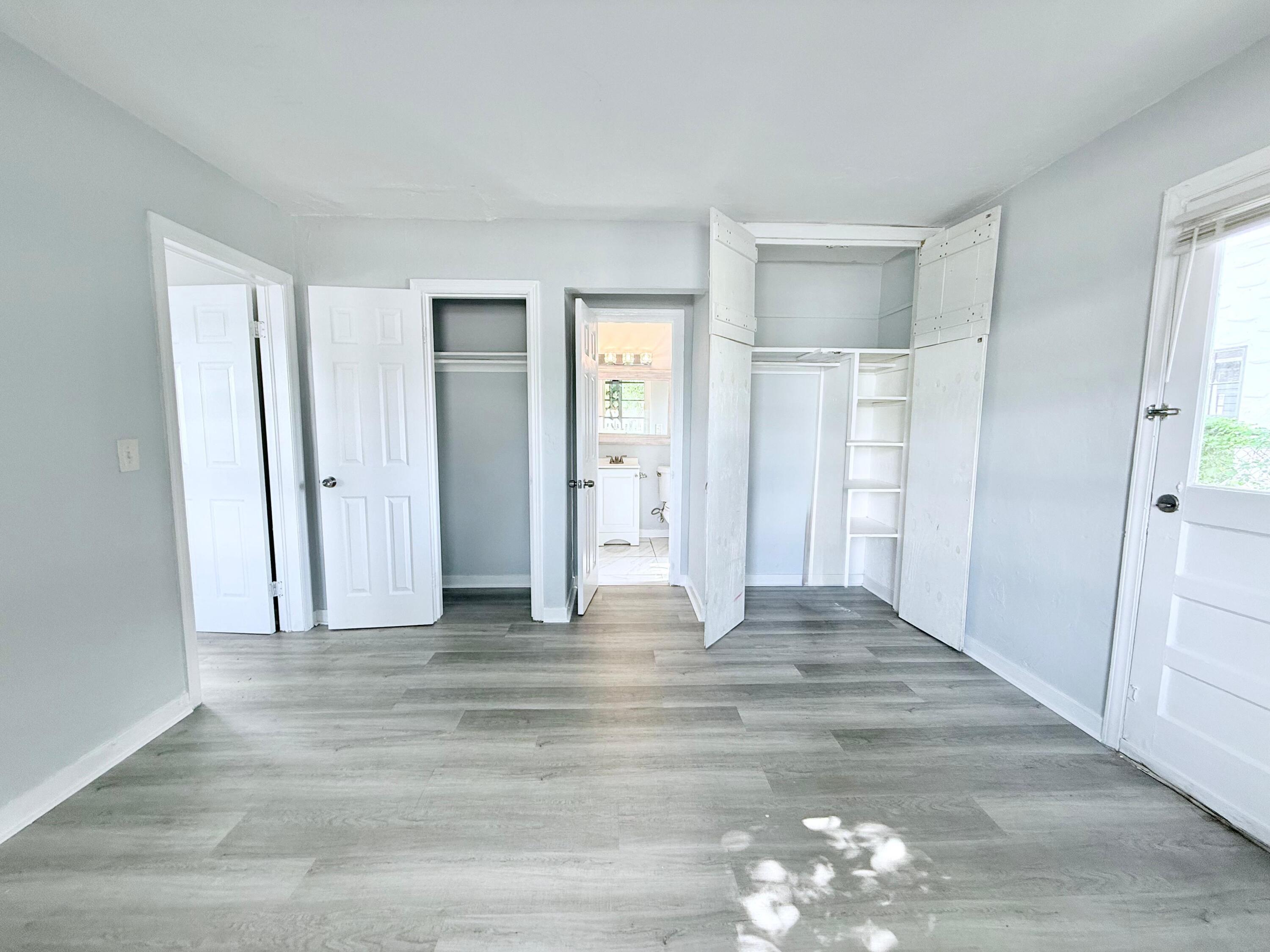 517 Kanuga Drive, Unit 1 West Palm Beach, FL 33401 - Photo 5 of 13 a view of empty room with window