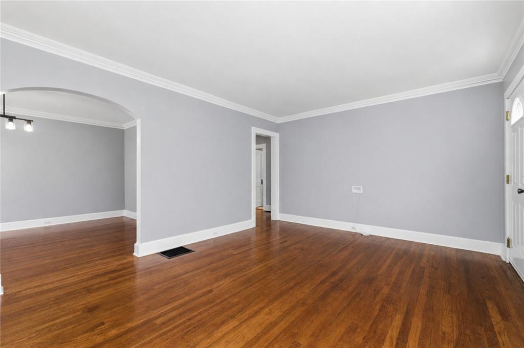 1128 Scott Boulevard Decatur, GA 30030 - Photo 22 of 45 a view of an empty room with wooden floor