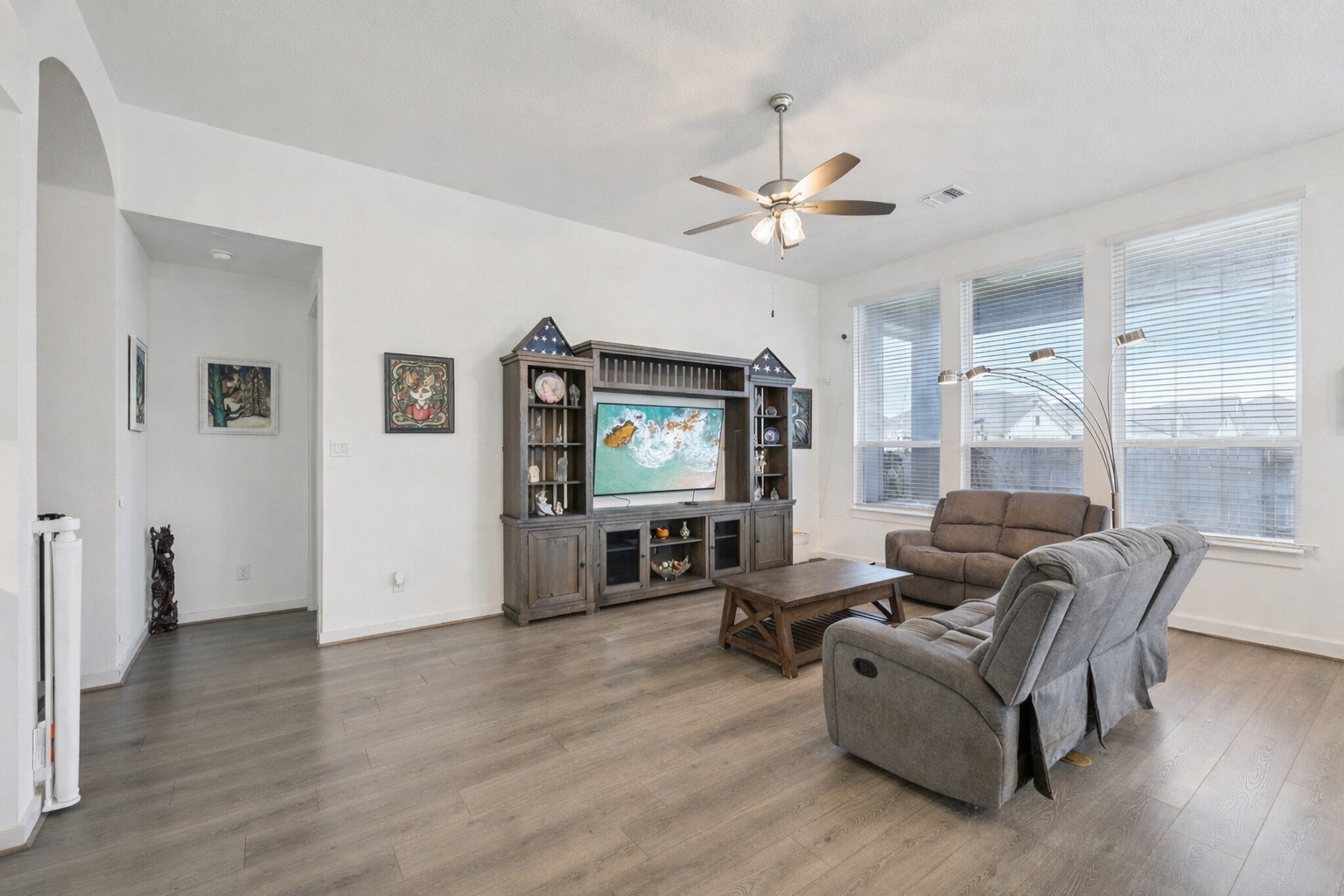 291 Billowing Way Kyle, TX 78640 - Photo 3 of 20 a living room with furniture and a wooden floor