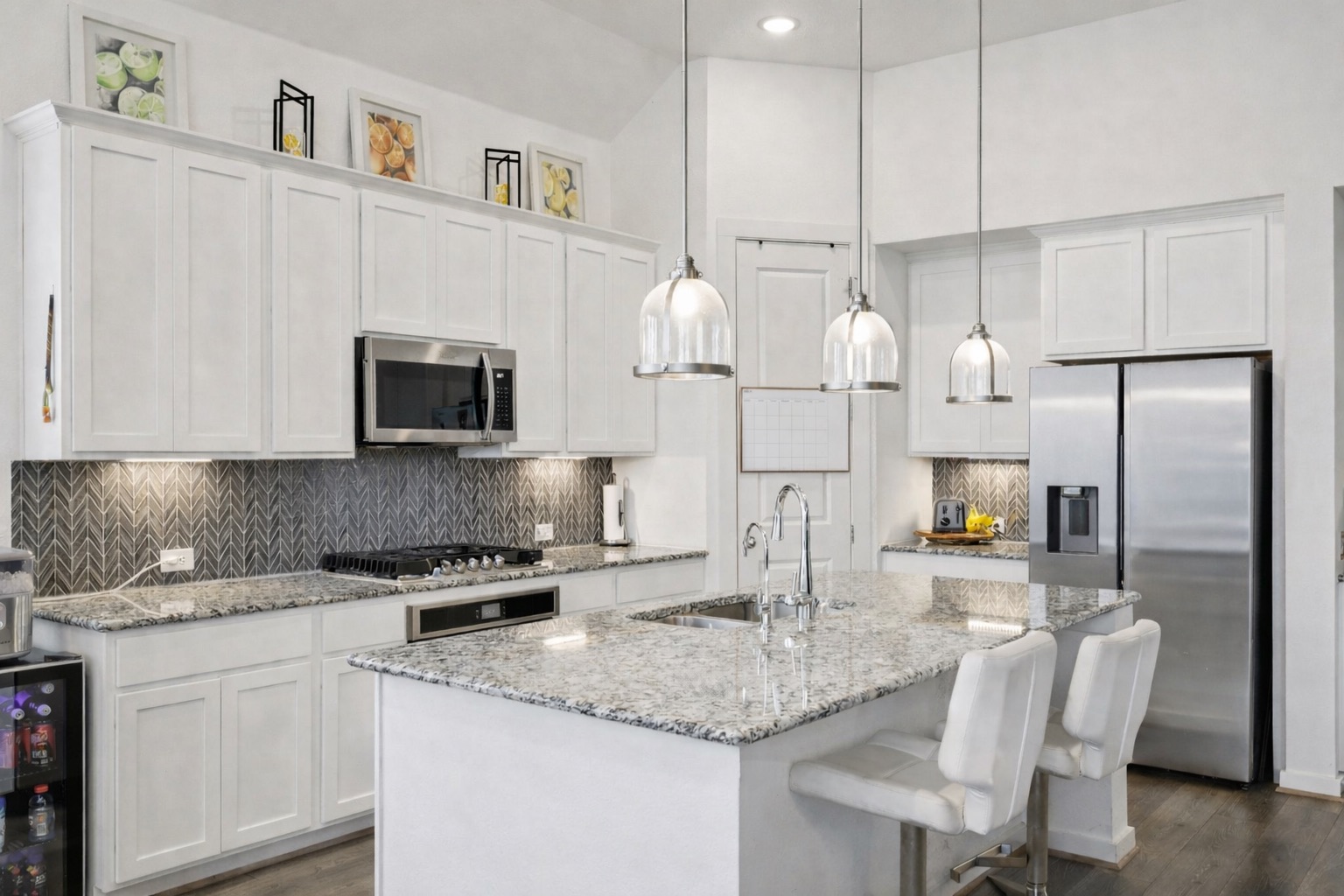 291 Billowing Way Kyle, TX 78640 - Photo 4 of 20 a kitchen with stainless steel appliances granite countertop a sink refrigerator and microwave
