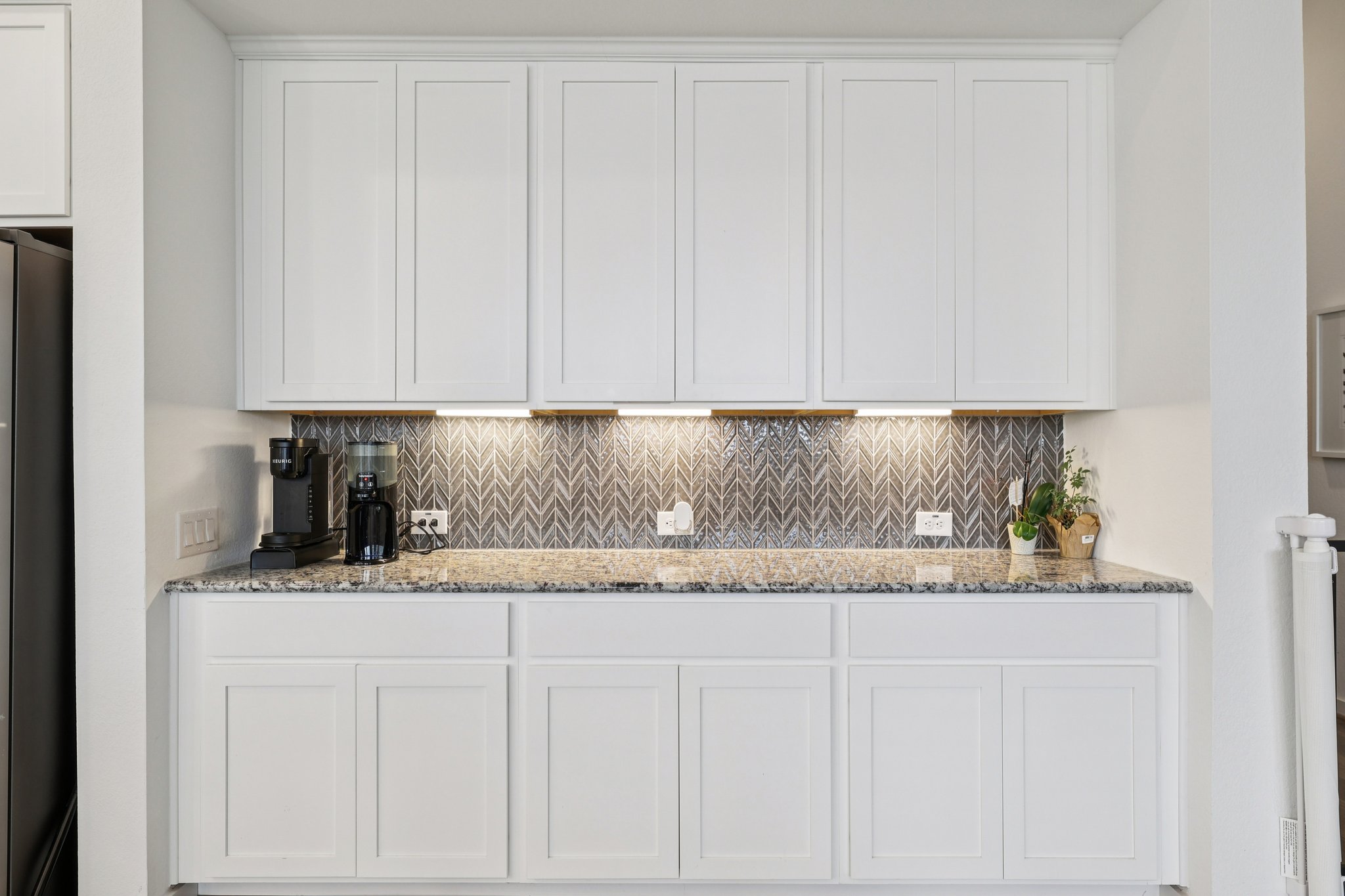 291 Billowing Way Kyle, TX 78640 - Photo 7 of 20 a kitchen with granite countertop white cabinets and sink