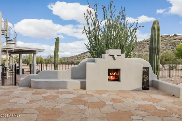 a view of a building with potted plants