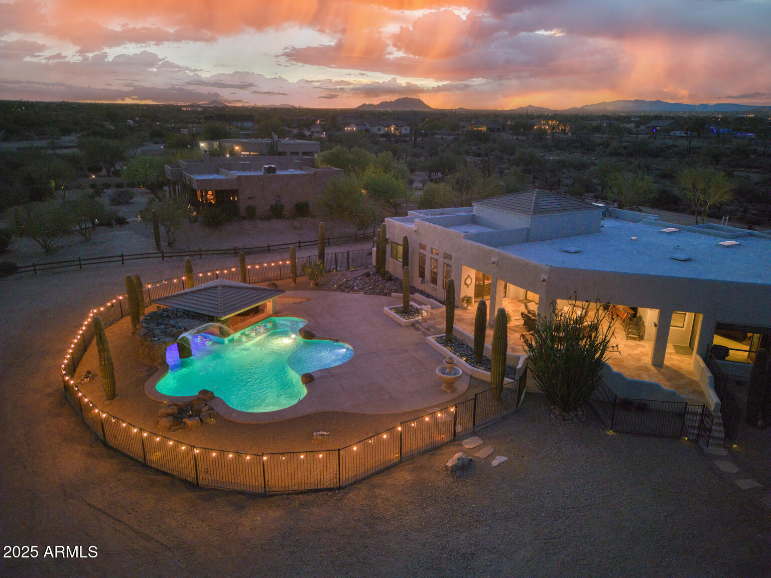 17449 East Quail Track Road Rio Verde, AZ 85263 - Photo 37 of 48 a view of a swimming pool with mountain view