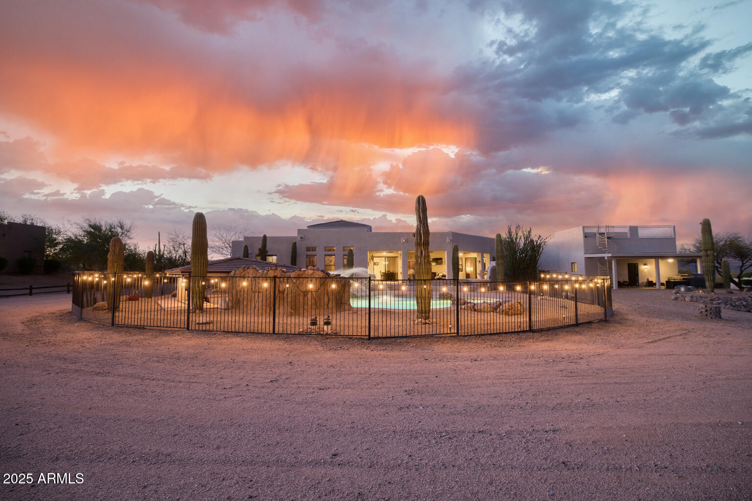 17449 East Quail Track Road Rio Verde, AZ 85263 - Photo 40 of 48 a view of a terrace with sitting area
