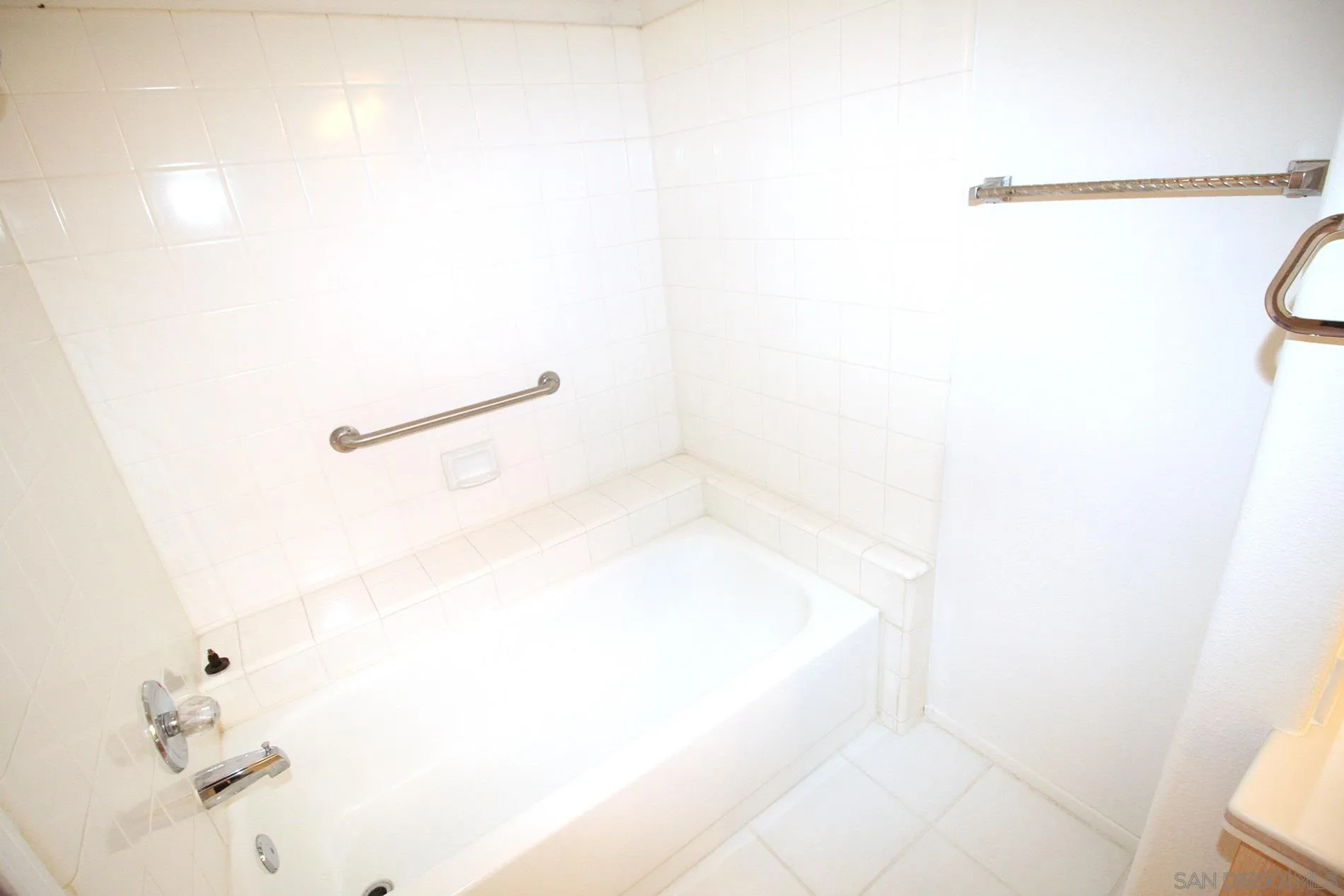 4190 Rhodes Way Oceanside, CA 92056 - Photo 16 of 25 a bathroom with a bathtub