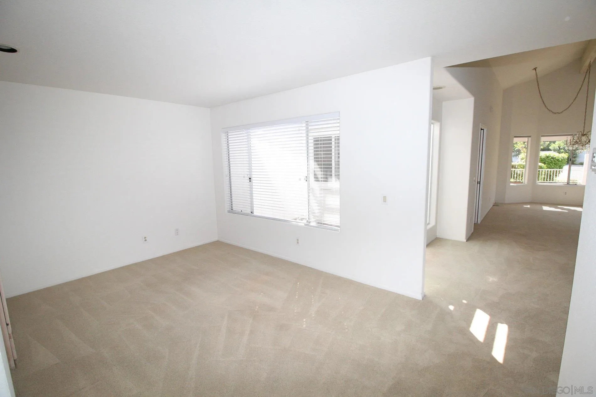 4190 Rhodes Way Oceanside, CA 92056 - Photo 19 of 25 an empty room with windows