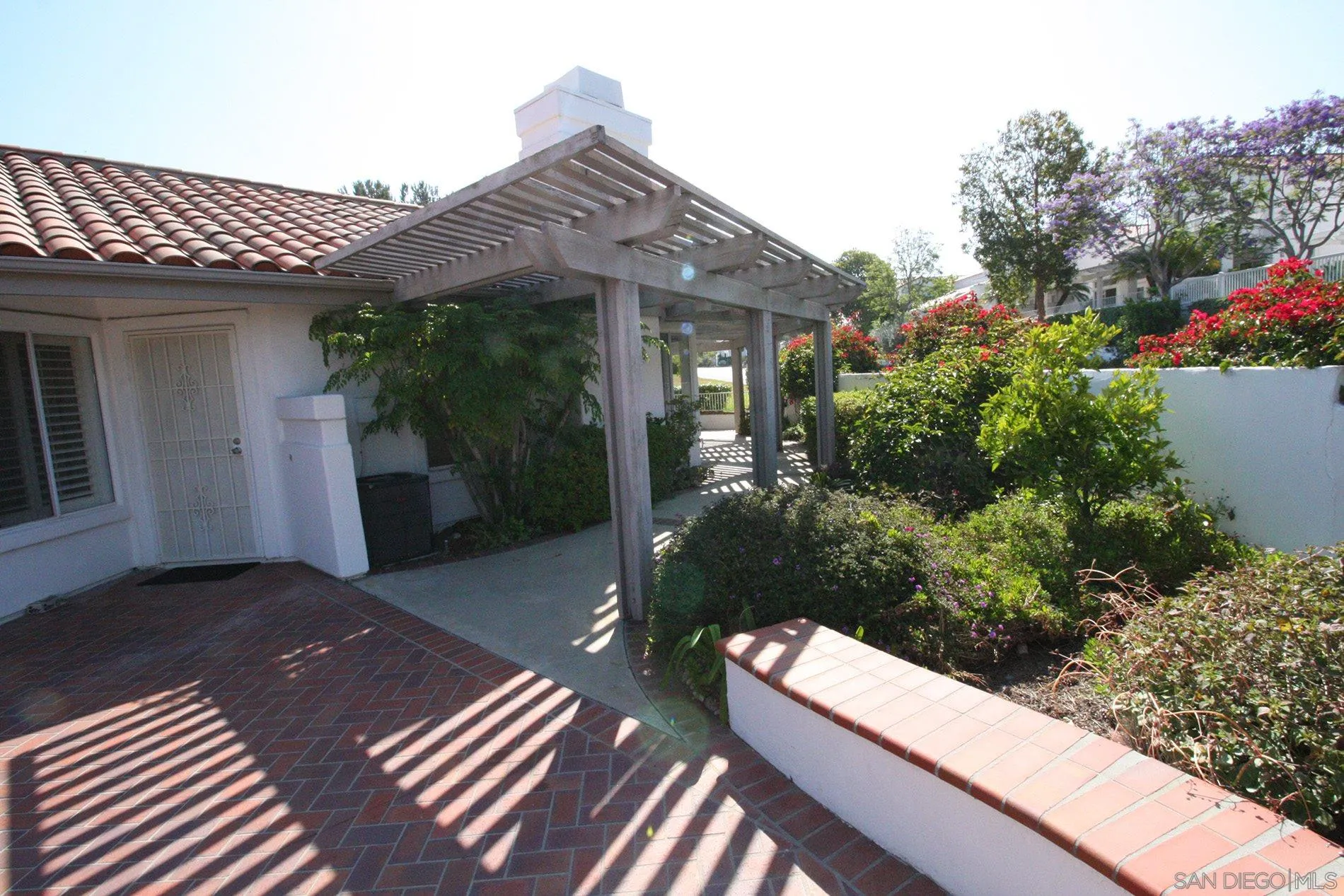 4190 Rhodes Way Oceanside, CA 92056 - Photo 23 of 25 a view of a house with a yard
