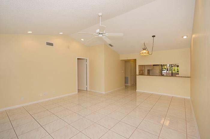 6839 Consolata Street Boca Raton, FL 33433 - Photo 6 of 20 great room facing kitchen
