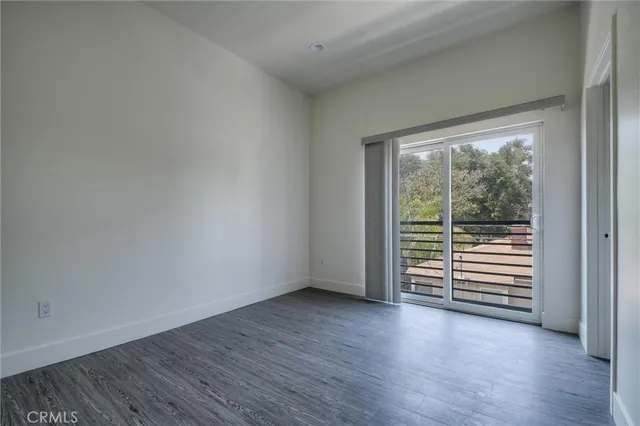 a bathroom with a sink toilet vanity and shower