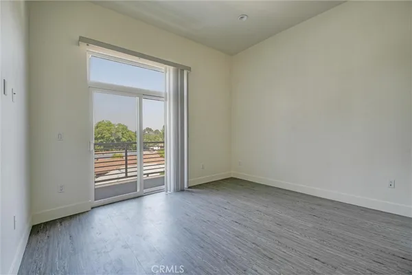 a view of small space with wooden floor