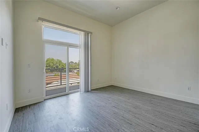 a view of small space with wooden floor