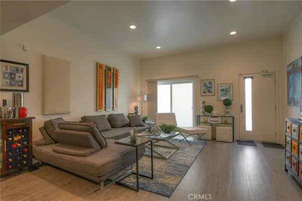a kitchen with stainless steel appliances granite countertop a stove and a sink