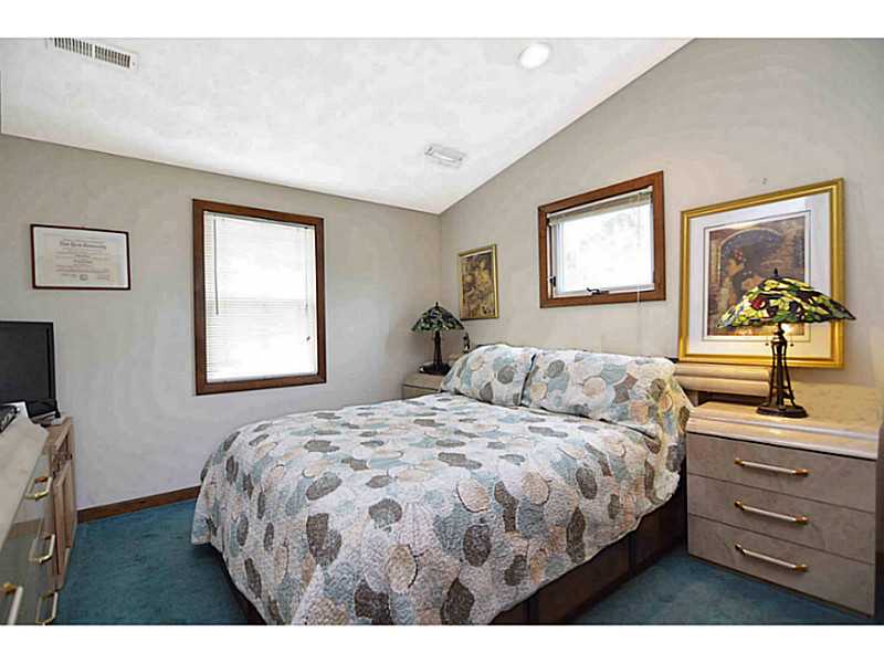 23 Angell Road Narragansett, RI 02882 - Photo 15 of 20 Bedroom. 2nd level master bedroom showcasing a cathedral ceiling and lots of natural light.