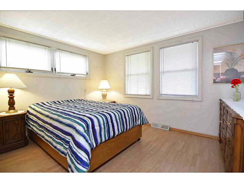 23 Angell Road Narragansett, RI 02882 - Photo 8 of 20 Bedroom. One of 3 bedrooms on 1st floor again with lots of windows and light.