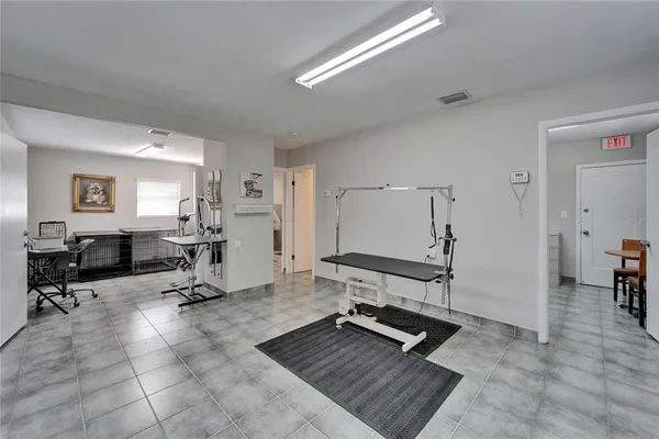 a bathroom with a sink a toilet and shower curtain