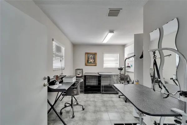 a kitchen with stainless steel appliances granite countertop a refrigerator a stove top oven a sink and dishwasher