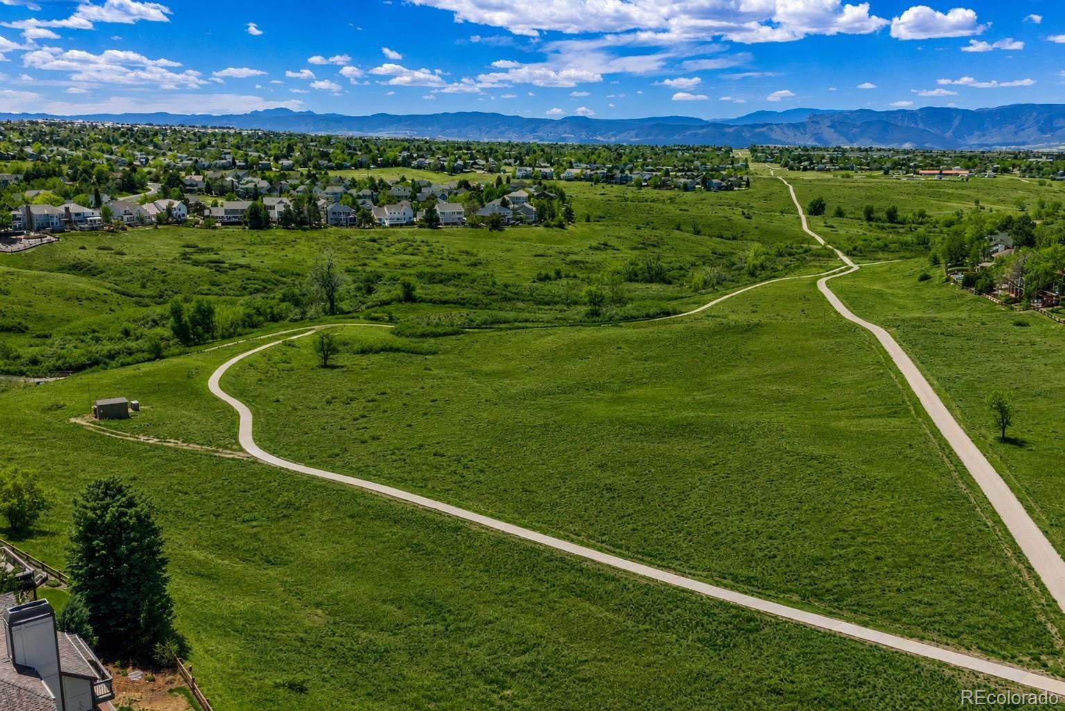 1914 Terrace Drive Highlands Ranch, CO 80126 - Photo 45 of 47 a view of a golf course with a big yard