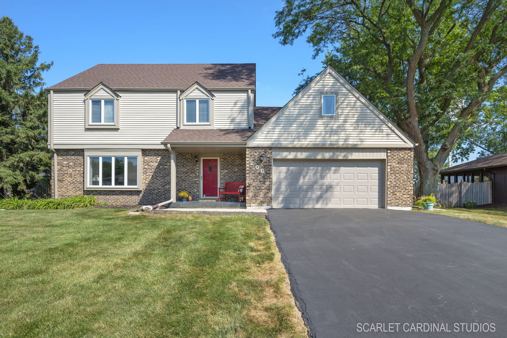 29W206 Wagner Road Naperville, IL 60564 - Photo 1 of 27 a view of a house with a yard and garage