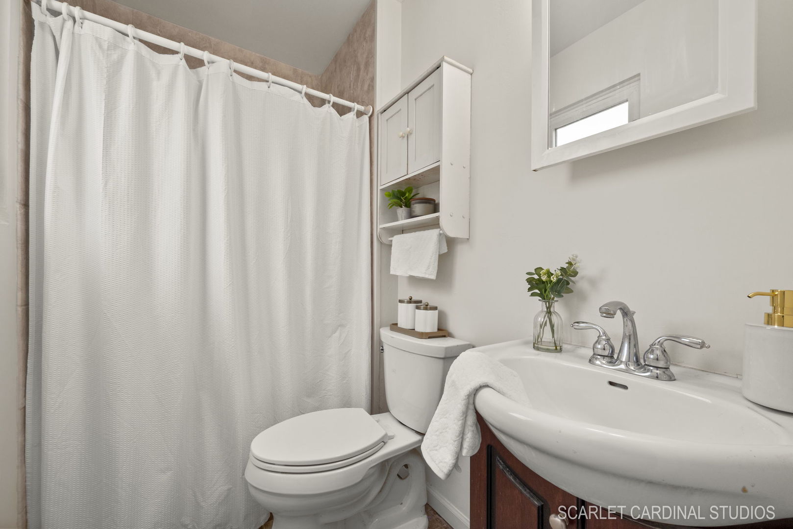 29W206 Wagner Road Naperville, IL 60564 - Photo 17 of 27 a bathroom with a sink and a mirror