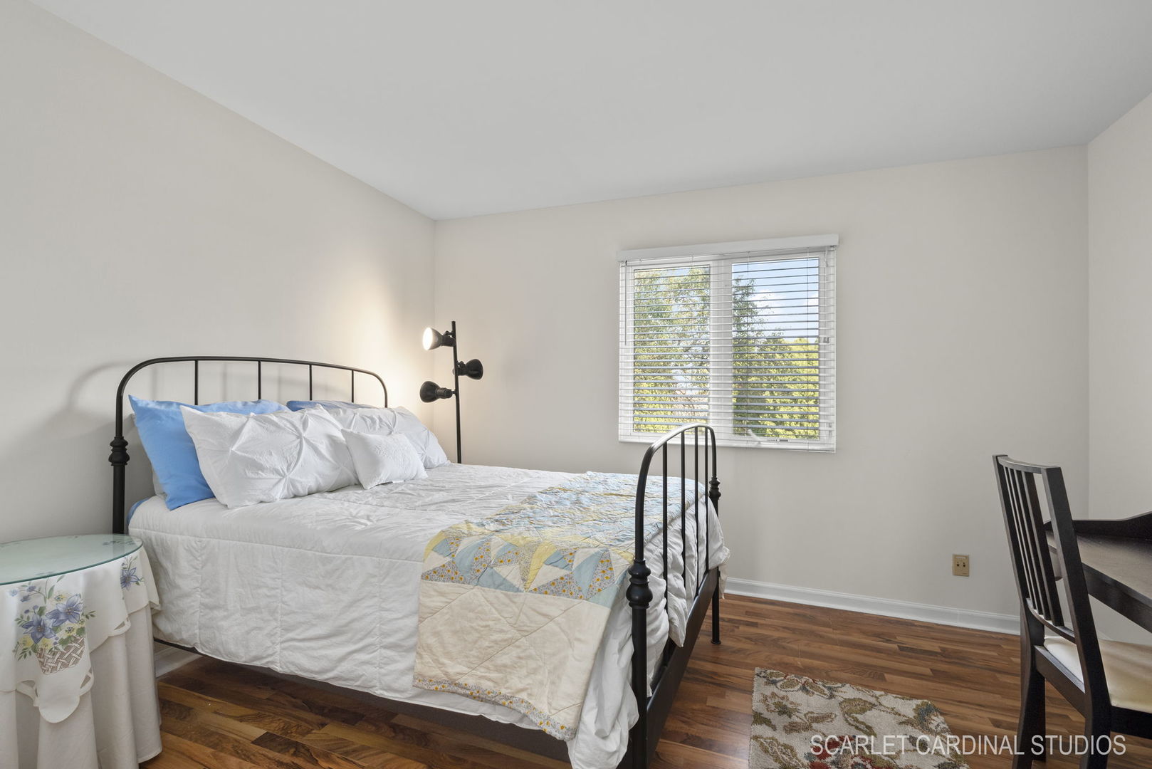 29W206 Wagner Road Naperville, IL 60564 - Photo 19 of 27 a bed sitting in a bedroom next to a window