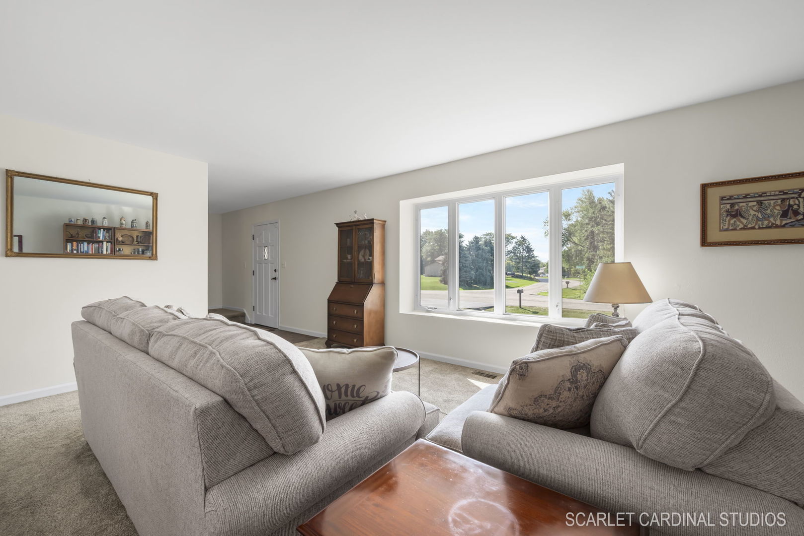29W206 Wagner Road Naperville, IL 60564 - Photo 5 of 27 a living room with a couch and a large window