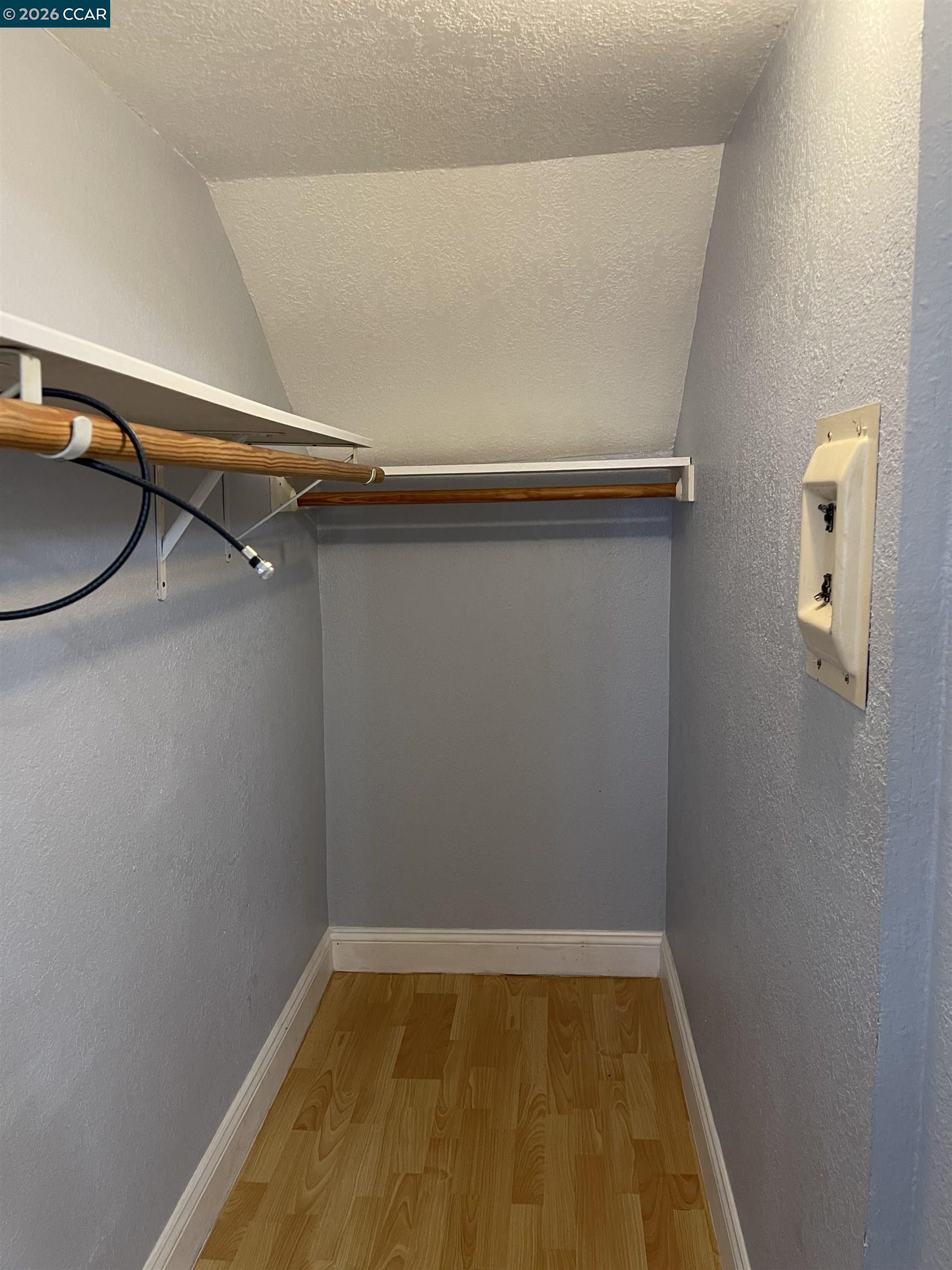 1705 Linden Street, Unit 2 Oakland, CA 94607 - Photo 10 of 22 closeup view of a room with racks on the wall