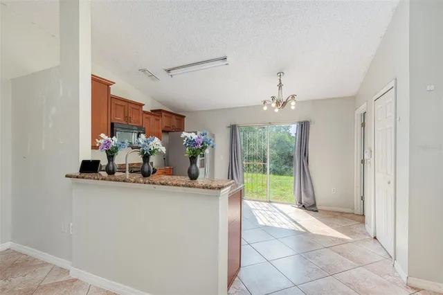 a view of a living room and dining room