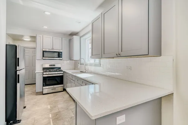 $550,000 | 7953 South Essex Avenue, Chicago, IL 60617