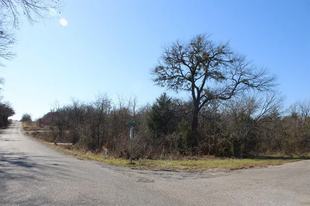 a view of a backyard of a house